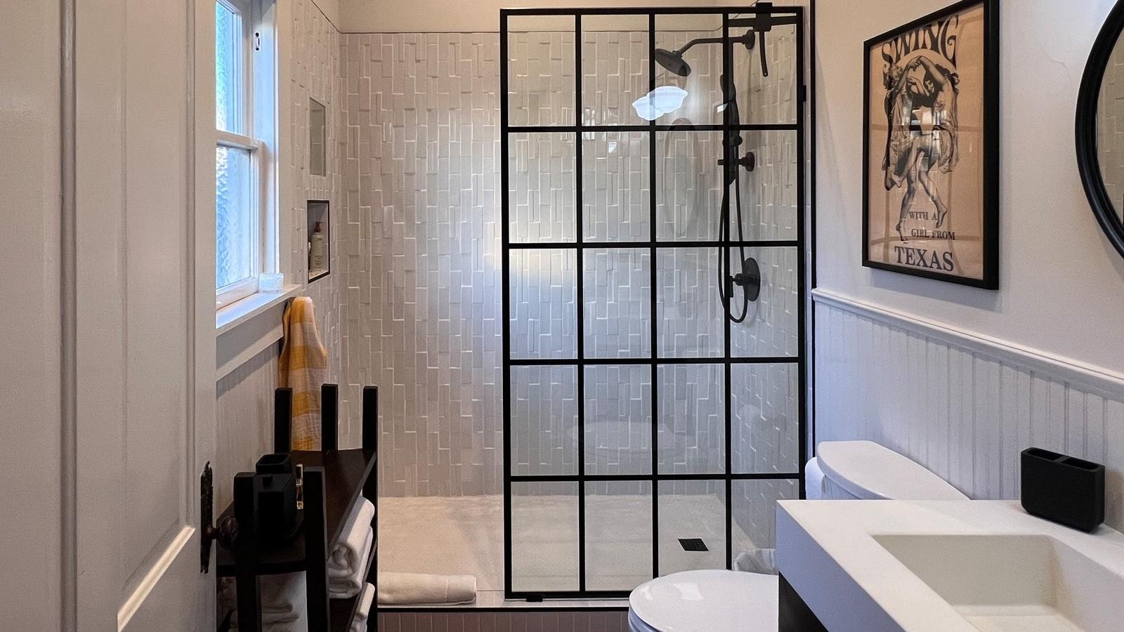 Walk-in shower with glass wall